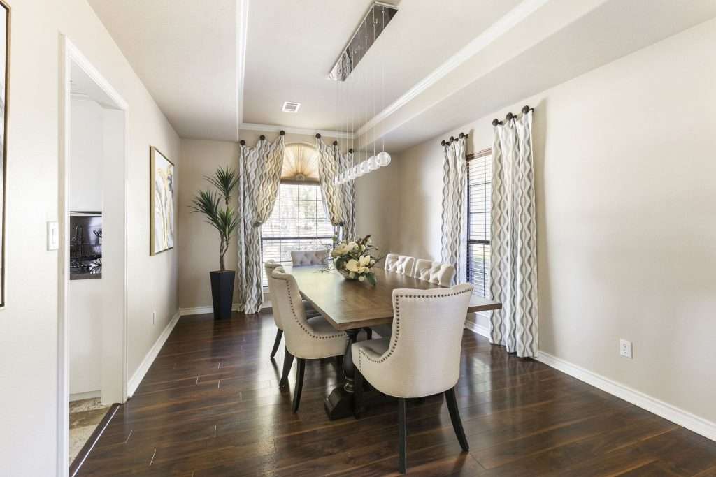Dining Room designed by Design on a Dime Interiors in Montgomery County, Texas
