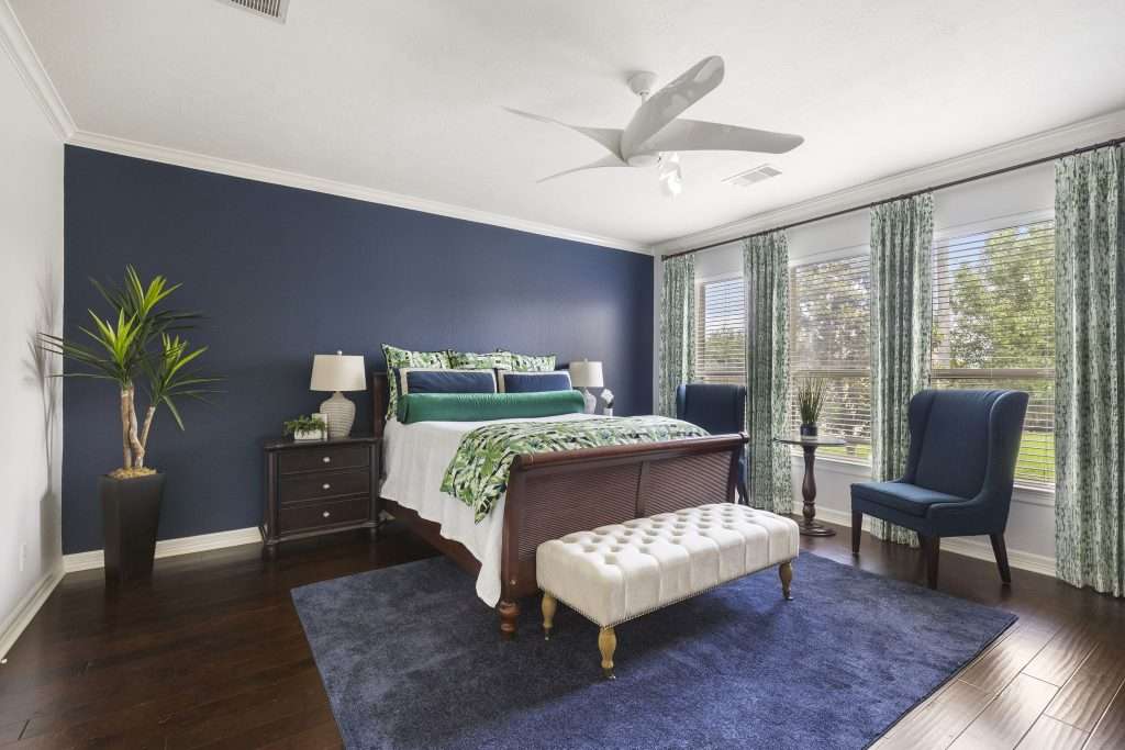 Master Bedroom designed by Design on a Dime Interiors in Montgomery County, Texas