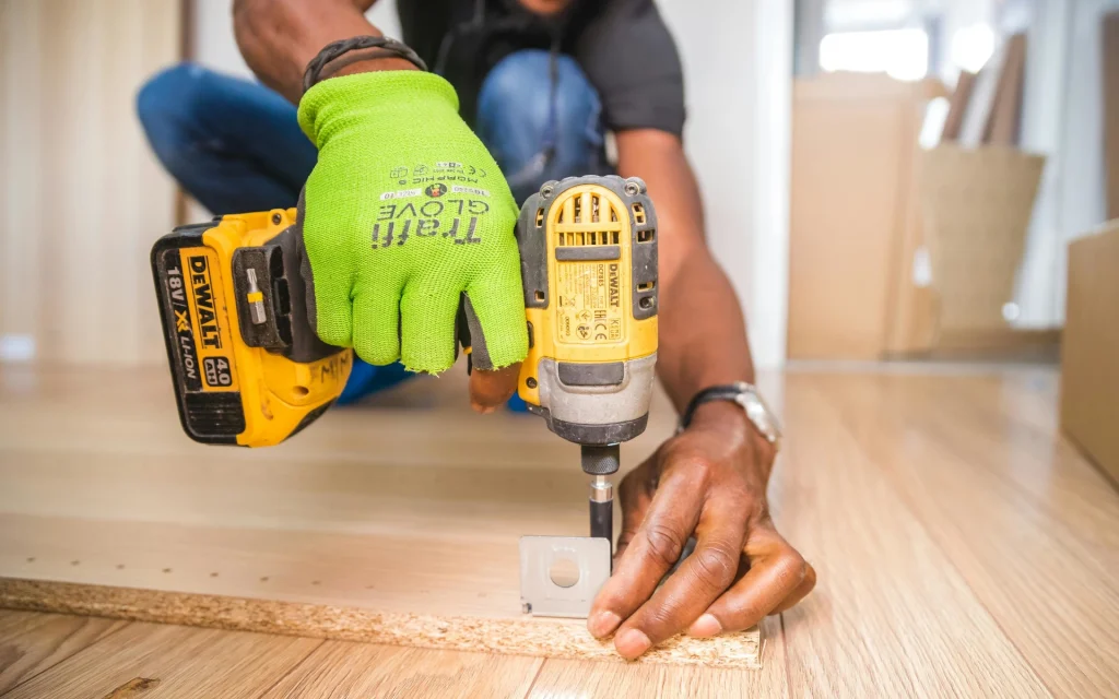 A person maintaining a floor