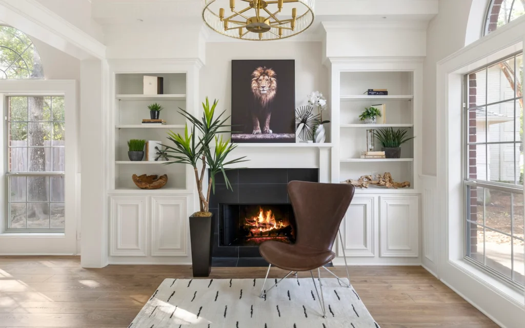 A fire place with a brown chair and wooden aesthetics