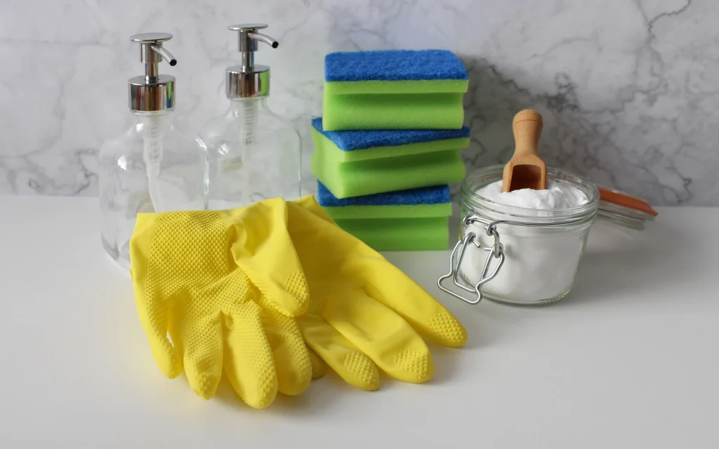 Yellow gloves and cleaning supplies