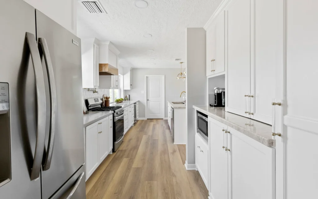 A kitchen with laminated flooring 