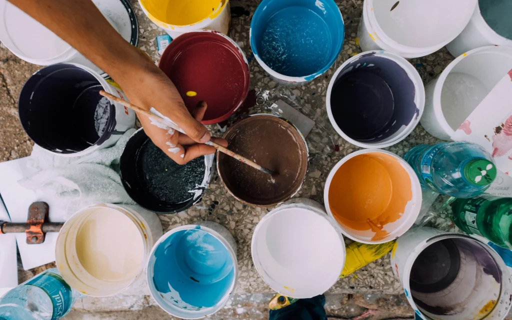 Different buckets of paint