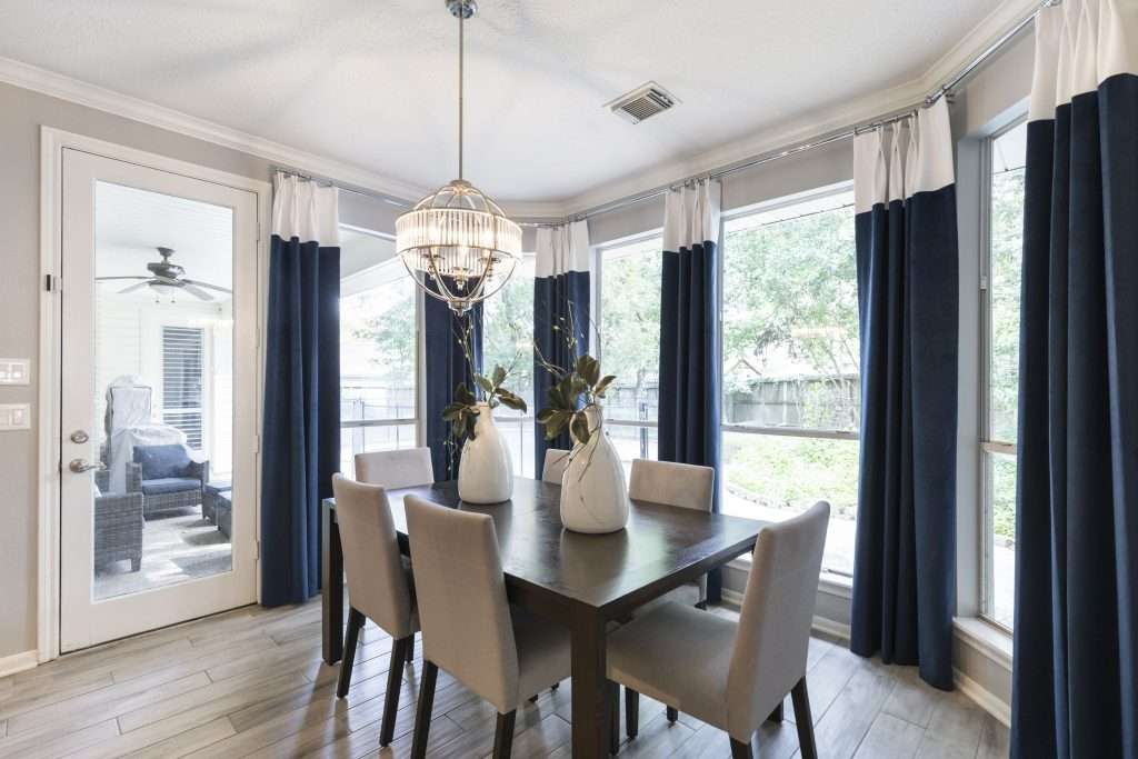 Dining Room designed by Design on a Dime Interiors in Montgomery County, Texas