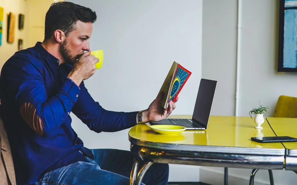 A yellow table and cup in an office