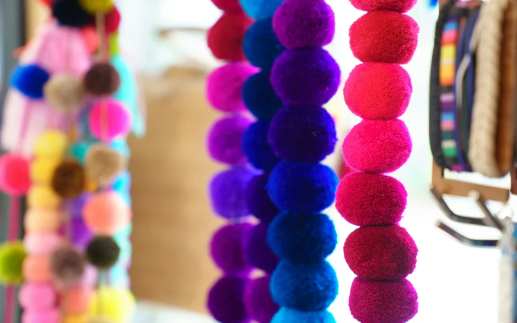 budget-friendly pom pom curtains