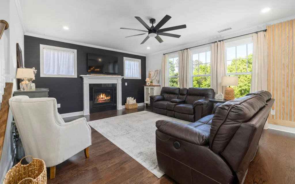 White framed fireplace in the living room
