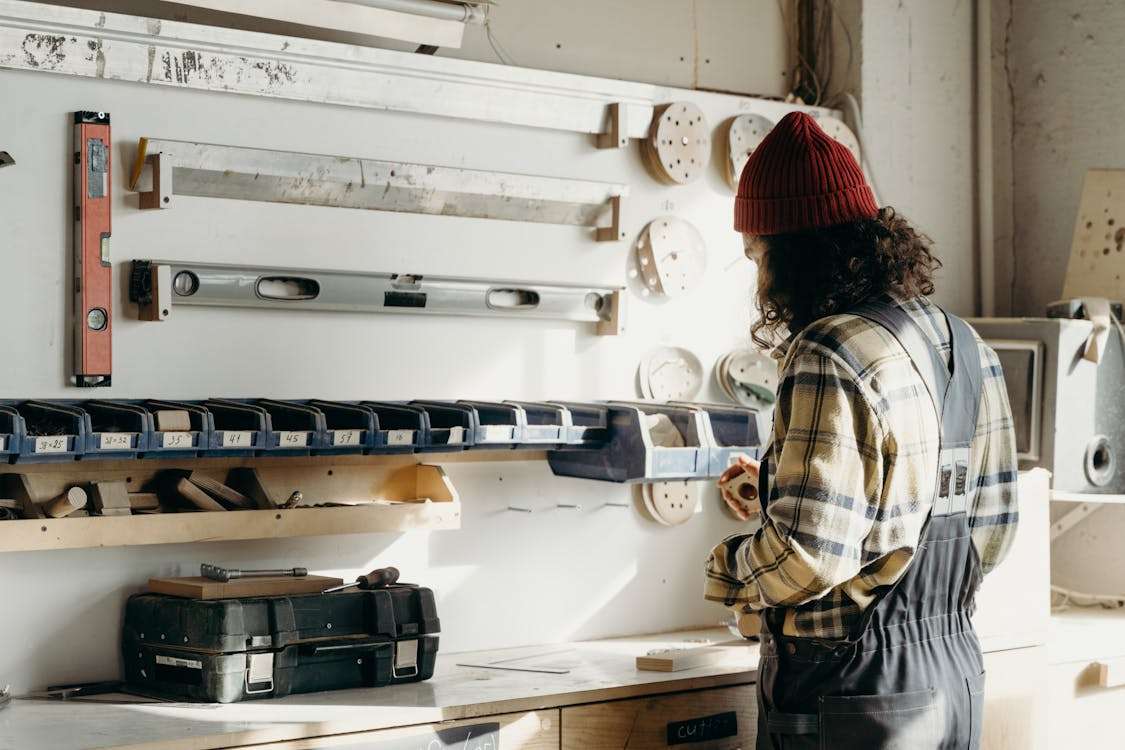 A man working in a garage in privacy