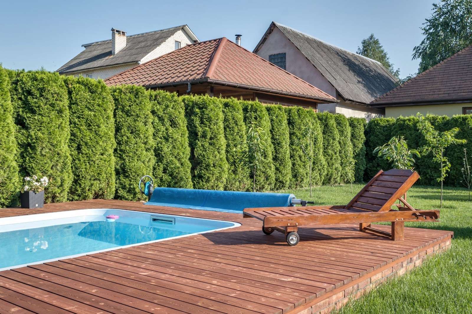 A backyard with a pool.